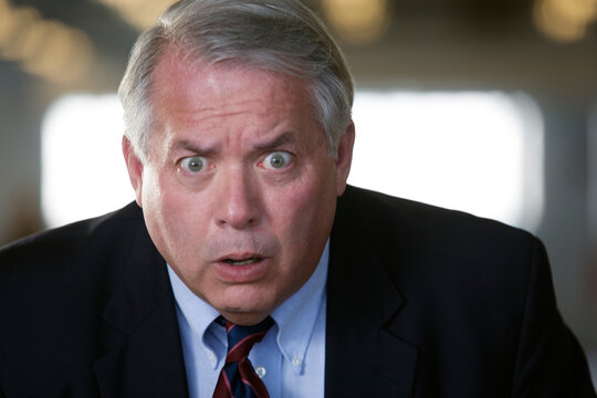 Portrait of a shocked business man
