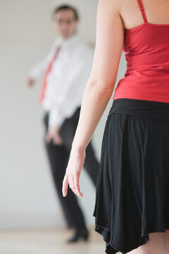 Mid section view of a woman standing