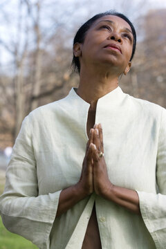 View of a mature woman praying
