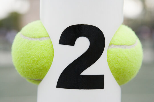 Close-up of two tennis balls