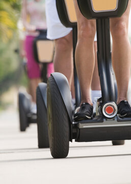 Tourists riding segways