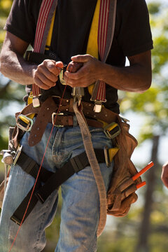 Carpenter using a chalk line at a construction site