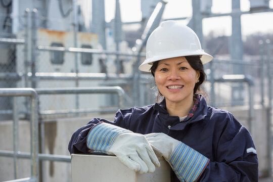 Portrait of female power engineer at power station