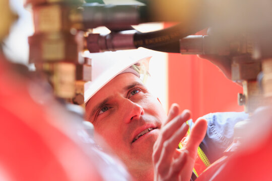 Industrial engineer checking gas valves at a power plant