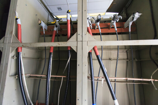 High current lines connecting to three phase bus at electric power plant