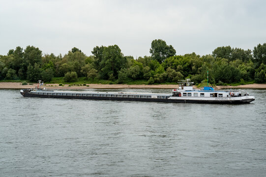 Rhin River kilometer 800, Voerde, North Rhine-Westphalia, Germany Cargo ship LENA papenburg sailing on rhine river in germany.
