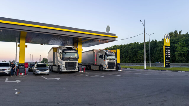 06.06.2026, Tula, Russia: Rosneft gas station in Russia with freight trucks refueling at dusk, fuel terminal supporting long haul transportation, logistics network, , fuel crisis concept