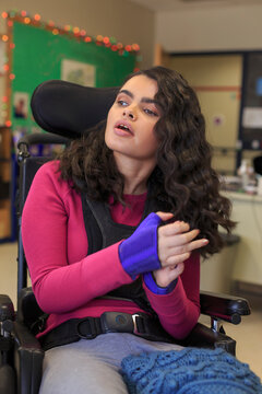 Girl with Tuberous Sclerosis learning at school