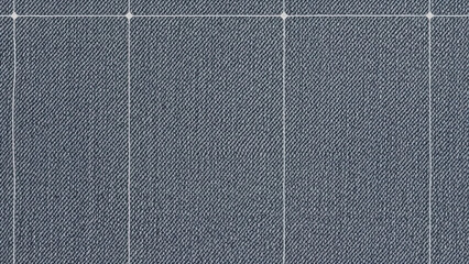 Fototapeta premium A closeup of a blue denim fabric with a visible grid pattern and white stitching lines.
