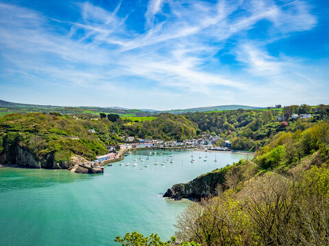 Fishguard Lower Town Harbour, Pembrokeshire. View of the old town and harbour from the coast path.