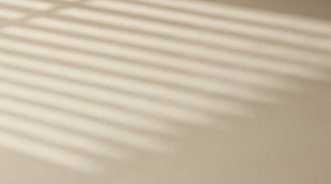 Sunlight filters through blinds onto a beige floor indoors
