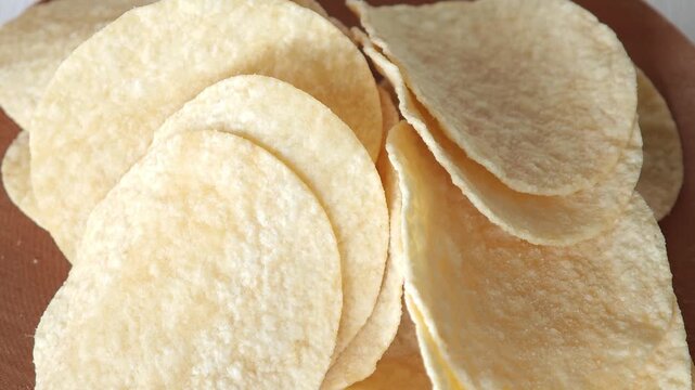 Potato chips on a plate.