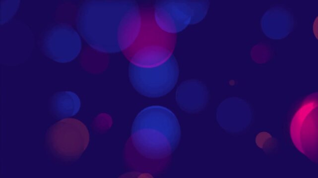 Colorful bokeh lights on dark background.