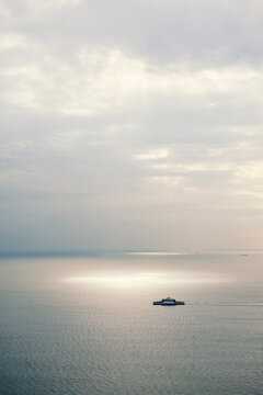 Ferry crosses a tranquil seascape