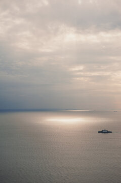 Ferry crosses a tranquil seascape
