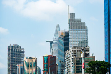 Fototapeta premium Modern skyscrapers and skyline of Ho Chi Minh City, Vietnam with Bitexco Tower.