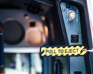 Obraz premium Pull to eject handle detail in a fast jet cockpit