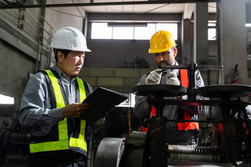 Fototapeta premium Quality Control Inspector Examining Metal Components in Factory