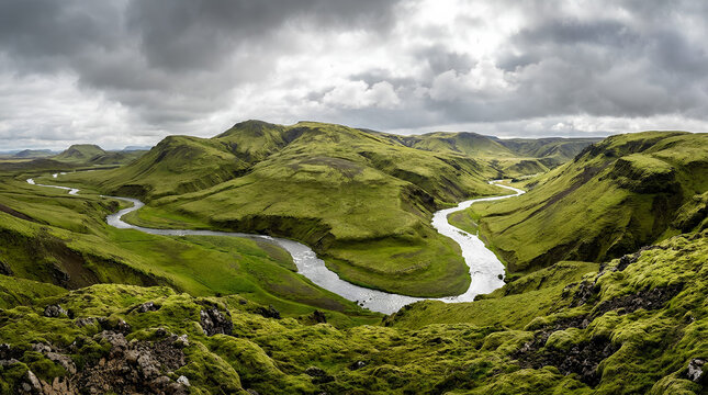 Epic wide-angle landscape of rolling volcanic hills covered in lush green moss with a silver winding river under a moody overcast sky.⁠