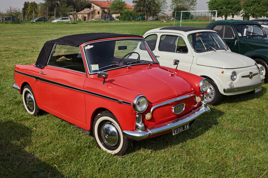 Vintage Italian Autobianchi Bianchina Cabrio (based on the Fiat 500) at a classic car rally, on April 25, 2015 in Piangipane, RA, Italy