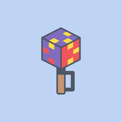 Fototapeta premium A colorful isometric cube toy with a handle on light blue