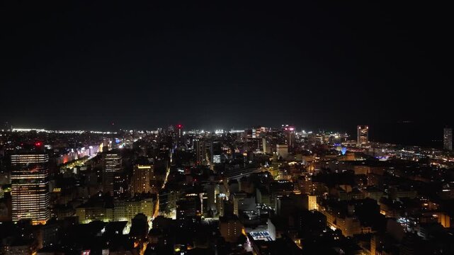 Centro porte&ntilde;o visto de noche con dron desde Puerto Madero hasta la Avenida 9 de Julio, edificios, nocturno, turismo, Buenos Aires, Argentina