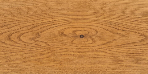 A close-up view of natural wood grain, showcasing the intricate patterns and a single knot, evoking a sense of organic texture and rustic beauty. © MAHIN