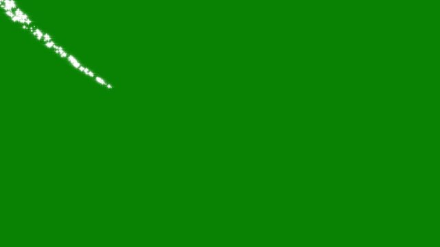 Sparkling shooting star particles trail loop with green screen chroma key overlay for magical fairy tale video editing visual effect 4k