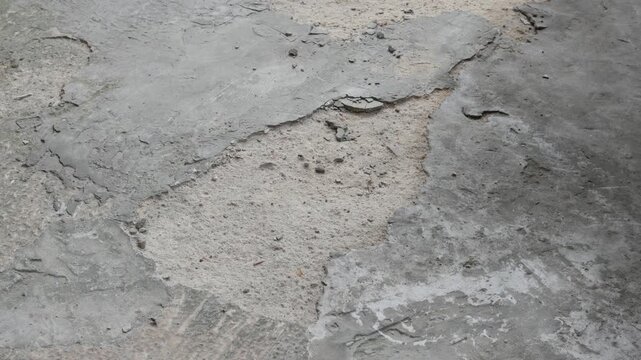 cement floor peeling due to standing water