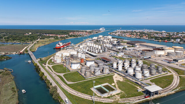 Ravenna, Italy, June 8, 2026: Aerial view of the industrial and port area, featuring storage tanks, power plants, steel manufacturing sites, and logistics infrastructure