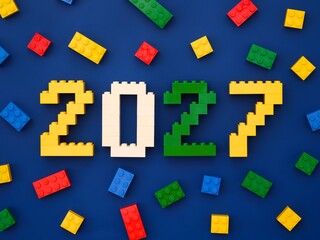 Obraz premium Tambov, Russian Federation - October 13, 2024 Lego numbers 2027 with some Lego bricks on a blue background.