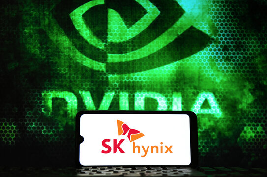 NVIDIA and SK Hynix Logos Displayed on Screen and Smartphone, Illustrating AI Microchip Partnership.
