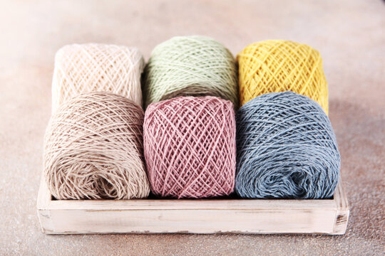 Skeins of yarn. Multicolored balls of cotton yarn. Yarn for knitting or crocheting. Hobby concept