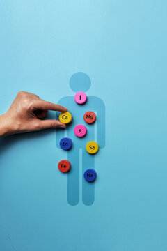 Mineral elements inside human body silhouette concept