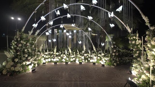 Luxury Wedding Decoration with Floral Mandap, Elegant Stage Setup, Beautiful Lighting, and Romantic Celebration Venue Design for Marriage Ceremony