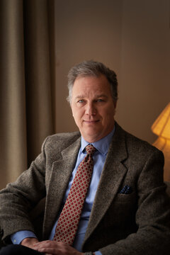 Mature executive portrait with confident professional expression