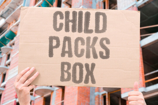"Child packs box" Young worker in warehouse shipping. CHILD. LABOR. SUPPLY. CHAIN. LOGISTICS.