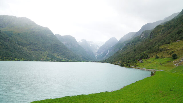 Green Misty Mountain and Glacier landscapes near Briksdal Glacier in Norway