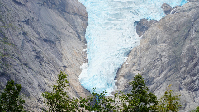 Green Misty Mountain and Glacier landscapes near Briksdal Glacier in Norway