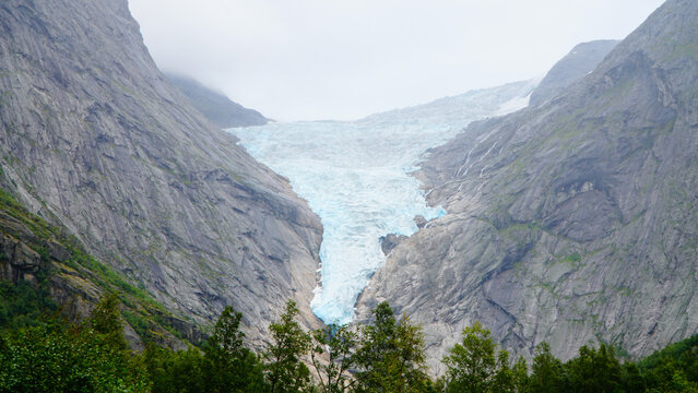 Green Misty Mountain and Glacier landscapes near Briksdal Glacier in Norway