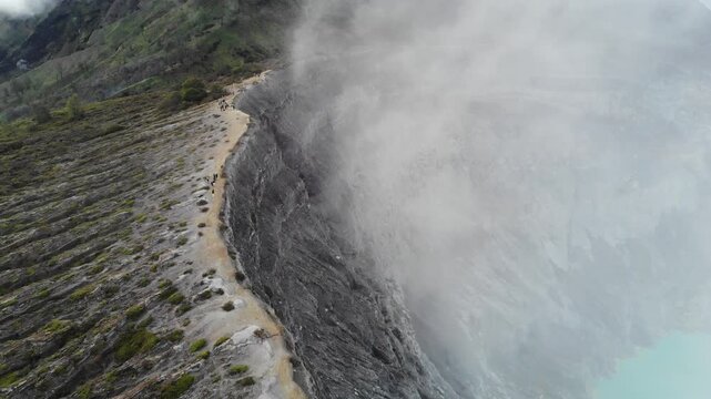 Aerial Drone Flying Towards Mount Ijen Volcano in Morning Light, East Java, Indonesia