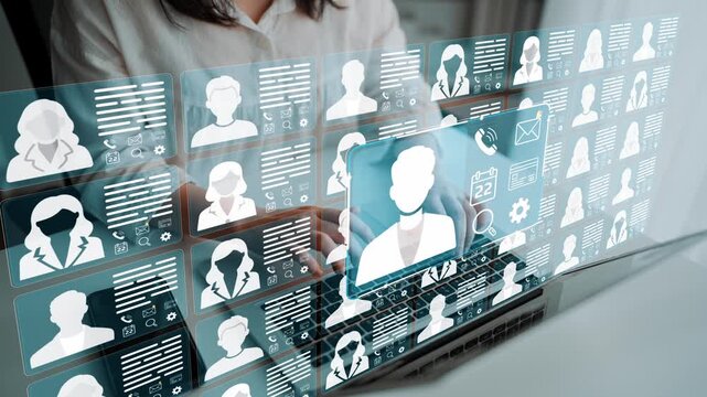 Modern Digital Interface with User Profiles and Data Management over a Laptop, Showcasing Technology Use in Contemporary Work Environment. Entropy.