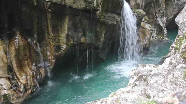 Small waterfall in Soca river gorge near Bovec village, Slovenia