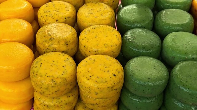 Various types of cheese on display at the Cheese Market (Kaasmarkt Alkmaar) on Waagplein Square, Alkmaar, Netherlands, May 15, 2026. High quality 4k footage