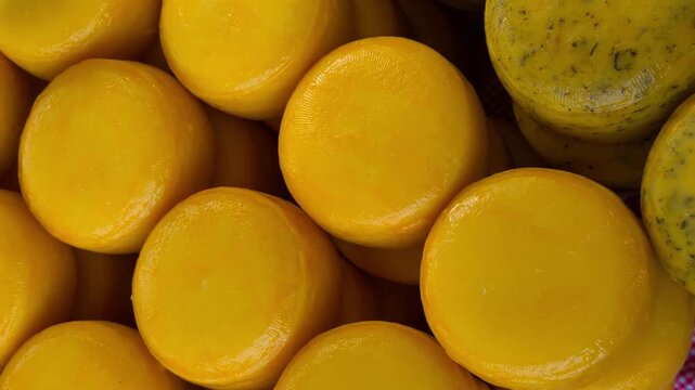 Various types of cheese on display at the Cheese Market (Kaasmarkt Alkmaar) on Waagplein Square, Alkmaar, Netherlands, May 15, 2026. High quality 4k footage