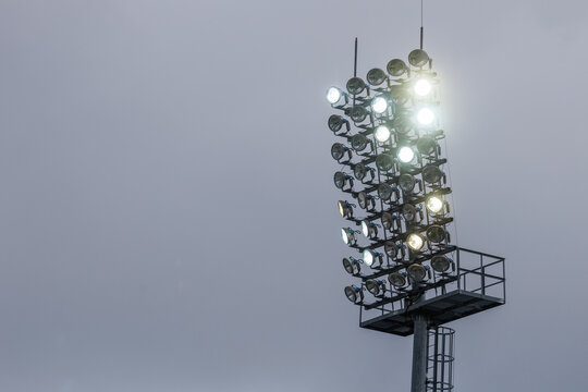 Football field light pole during twilight