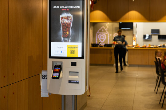 McDonalds self service kiosk terminal with menu screen in Lviv Ukraine restaurant
