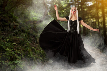 Fototapeta premium Beautiful elf girl in enchanted forest. Mysterious fairy