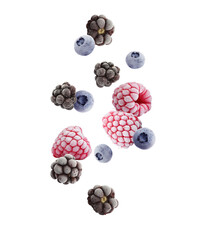 Different frozen berries falling against white background