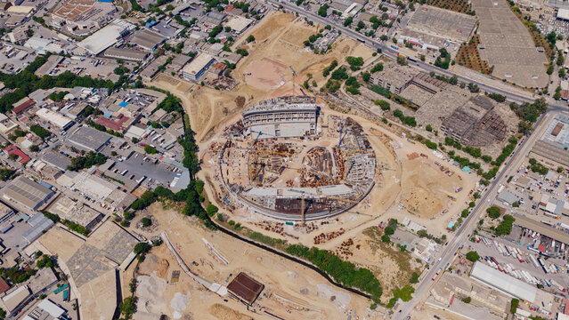 Agia sophia stadium, home of aek fc, developing its structure during the construction phase viewed from an aerial perspective in the urban landscape of nea filadelfia, athens, greece